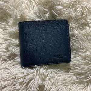 Coach men’s wallet.